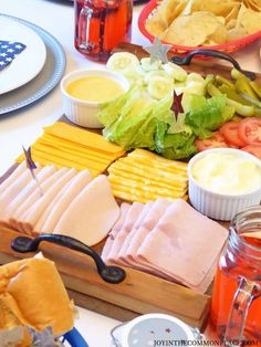 an assortment of food is displayed on a table