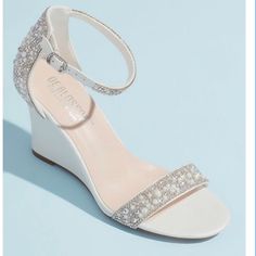 Pearly Jewels, Brilliant Crystals, And Pave Stones Encrust The Heel, Ankle Strap, And Toe Strap Of These Elegant Sandals. The Dazzling Embellishment Provides Elegant Detail To Your Look While The Comfortable Wedge Heel Is Perfect For Dancing Through The Night. By Deblossom Collection Synthetic 2.75" Heel Adjustable Buckle Imported Classic Wedding Shoes, Comfortable Wedding Heels, White Ankle Strap Heels, Bridal Shoes Low Heel, Wedding Shoes Comfortable