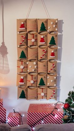 christmas presents are wrapped in brown paper and hung on the wall