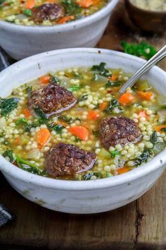 two bowls of soup with meatballs and vegetables