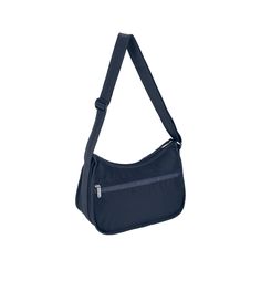 Zipped main closure, Exterior front pocket with zipped closure, Exterior back pocket with zipped closure, Interior back wall hanging zipper pocket, Adjustable shoulder strap (Max. 50in / 127cm), Includes matching pouch with zipped closureDimensions: 9H x 12W x 5.25D in, 22.86H x 30.48W x 13.34D cmMade with recycled content: The ripstop body fabric used for this product is made from recycled post-industrial fibers. Navy Shoulder Bag With Zipper Closure, Blue Travel Shoulder Bag With Side Pockets, Blue Shoulder Bag With Side Pockets For Travel, Functional Navy Shoulder Bag With Zipper, Functional Navy Shoulder Bag With Zipper Closure, Blue Solid, Sea Blue, Deep Sea, Blue Sea