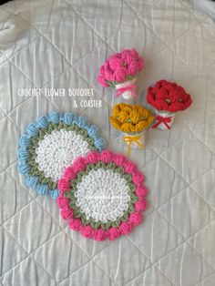 crochet flower bouquets and coasters on a white quilted bed spread