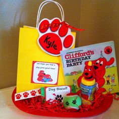 a birthday gift basket with books and toys