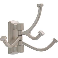 a white wall mounted hook with two hooks on each side and an extension to it