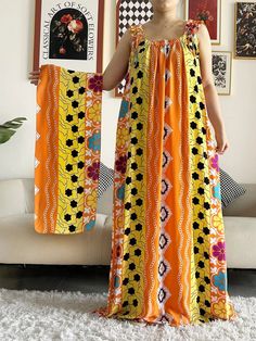 Indulge in the epitome of African-inspired fashion with our Dashiki Maxi Elegance collection. This sleeveless cotton summer dress exudes grace and style, featuring a flattering silhouette that celebrates the vibrancy of cultural expression. Bust: 131cm Waist: 131cm Dress Length: 143cm Available in 4 stunning colors, each variant of our Dashiki Maxi Elegance dress is a testament to the fusion of tradition and contemporary elegance. The sleeveless design ensures comfort in warm summer days, allowi Nigeria Clothes, Elegance Dress, Sleeveless Cotton Dress, Cotton Summer Dress, African Dashiki, Kaftan Style, African Inspired Fashion, Cotton Dress Summer, Sleeveless Dress Summer