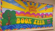 a painting on the wall of a children's room with an image of a book fair