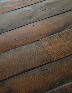 an old wooden floor is being displayed on the iphone