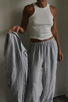 Experience effortless style with our new Patricia Linen Pant. Our premium linen fabric offers a lightweight and soft texture, perfect for every season. The simple elastic waistline and functional side pockets make this pant a versatile choice - wear it high on your waist for a tailored look or lower on your hips for a relaxed vibe. Coordinate with our Arlo Top for a timeless outfit.Made in USA Relaxed Everyday Bottoms, Relaxed Everyday Long Pants, Relaxed Long Pants For Everyday Wear, Wide Leg Bottoms For Summer Casual Gatherings, Spring Casual Bottoms With Straight Hem, Casual Spring Bottoms With Straight Hem, Casual Bottoms For Spring With Straight Hem, Casual Linen Pants For Casual Gatherings, Versatile Summer Bottoms For Casual Gatherings