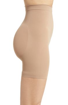 Sculpt your body's natural shape with shaping shorts that hit just above the knee with a whisper-soft and seamless design from Kim Kardashian's SKIMS. Reflecting the brand's passion for highly technical shapewear solutions for every body, this staple piece smoothes your upper legs while lifting your butt and comes in different shades to complement your skin tone. 5" regular inseam Cotton-lined gusset 82% nylon, 18% elastane Machine wash, tumble dry Made in Turkey Mid-thigh Length Seamless Shaping Biker Shorts, Beige Seamless Mid-thigh Shapewear, Seamless Shaping Shapewear With Short Leg, Shaping Shapewear With Short Inseam, Beige Smoothing Shapewear Mid-thigh Length, Smoothing Shapewear Above Knee, Smoothing Above-knee Shapewear, Fitted Seamless Shapewear Above Knee, Fitted Seamless Above Knee Shapewear