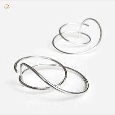 Edith Toledano | Sterling Silver Large Thick Hoop Studs, Gauged Hoops for 18g Piercings, Spiral Wire Earrings, Sculptural Statement Hoop Earrings, Ear Jackets | #SterlingSilverHoops #SterlingSilverHoopStuds #SterlingSilverHoopEarrings #HoopEarrings #HoopStuds #LargeHoops #ThickHoops #GaugedHoops #18GaugePiercings #SpiralEarrings #WireEarrings #SculpturalEarrings  #StatementEarrings #EarJackets #EdithToledano #Etsy