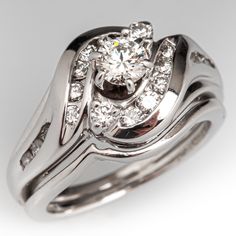 a white gold ring with diamonds on it