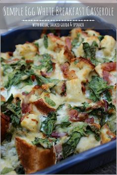 a casserole with bacon, spinach and cheese in a blue baking dish