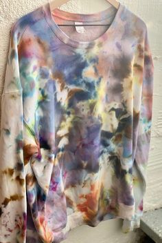 Unisex Hand-dyed Pull-over Oversized Fleece Sweatshirt L/XL (new). Super soft and cozy, this pull-over sweatshirt has been hand-dyed using an ice dye method and fiber-reactive dyes to create a beautiful one-of-a-kind piece. Material: 80% Cotton 20% Polyester Knit, med to heavyweight. Brushed fleece inside. Style/Size: This is Unisex L/X Chest measures 24" from armhole to armhole (48" total circumference). Length measures 30" from high point shoulder to bottom hem. Long sleeves. Rib cuff and bott Ice Dye, Womens Hoodies, Ice Dyeing, Fleece Sweatshirt, Beautiful One, High Point, Creative Projects, Hand Dyeing, Hoodies Womens