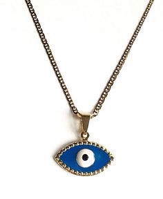 "18K GOLD FILLED EVIL EYE NECKLACE . FOR GOOD LUCK , PROTECTION, HEALTH AND BAD EYE. 20\" LONG CHAIN. PENDANT:24x12mm 18K GOLD FILLED CADENA DE OJO DE LA BUENA SUERTE . PARA BUENA SUERTE,PROTECCION, SALUD Y MAL DE OJO. 20\" LARGO CADENA. DIJE:24x12mm" Gold Chain Necklace With Evil Eye As Gift, Gold Chain Necklace With Evil Eye For Gift, Gold Plated Adjustable Chain Necklace For Good Luck, Figaro Necklace, Good Luck Bracelet, For Good Luck, Pompano Beach, Evil Eye Pendant, Evil Eye Necklace