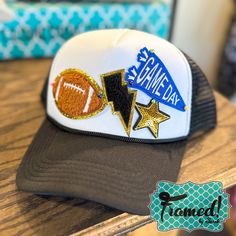 Looking for a stylish and unique accessory? These Game Day Trucker Hats are just what you need! This hat is designed to fit any head comfortably and add a touch of personalization to your outfit. Perfect for the wearing to your favorite weekend event! PS - Not exactly what you want? Come see us at the Warehouse and we'll make a custom hat for YOU! Adjustable Customizable Sports Fan Hat, Sports Fan Cap One Size Fits Most, Sports Fan Cap Hat One Size Fits Most, Adjustable Cap For Game Day, Adjustable Fun Hats For Sports Events, Fun Trucker Hat For Game Day, Fun Cap For Game Day, Fun Game Day Cap, Pink Games