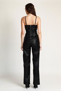 A jumpsuit that brings out your inner rockstar. Trendy Party Overall Jumpsuits And Rompers, Chic Fitted Overalls For Night Out, Fitted Chic Overalls For Night Out, Chic Strapless Overall Jumpsuit For Night Out, Black Strapless Jumpsuit For Night Out, Leather Jumpsuit, Promotional Banners, Vegan Leather, Jumpsuit