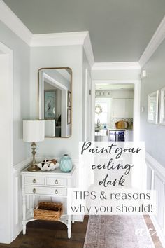 a hallway with white walls and wood flooring that says paint your ceiling dark tips & reasons why you should