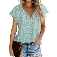 Fantaslook Blouses for Women Floral Print V Neck Ruffle Short Sleeve Shirts Casual Summer Tops This blouses for women is made with lightweight and flowy material that makes you feeling well for the soft skin. The womens blouse features with v neck, ruffle short sleeve to shape the perfect outline of your arms, floral printed deorations to this dressy shirts. Womens floral printed v neck tops and blouses shows off a slimmer elegant fashionable look with the flowing swing hem design. Tie on the fr Beautiful Tops, Flattering Tops, Ruffle Shorts, Loose Blouse, Short En Jean, Green Blouse, V Neck Blouse, Tops For Women, Top Casual