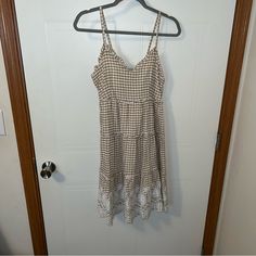 Never Worn Before. It’s Super Cute I Didn’t Try It On Before I Bought It And It’s Too Tight On My Chest. Casual Gingham Cotton Midi Dress, Casual Sleeveless Gingham Midi Dress, Casual Gingham Midi Dress For Brunch, Casual Gingham Sundress For Brunch, White Sleeveless Cotton Plaid Dress, Sleeveless Cotton Plaid Dress, Plaid Cotton Midi Dress For Day Out, White Cotton Plaid Dress For Brunch, Casual Sleeveless Plaid Dress For Brunch