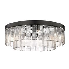 a round chandelier with glass blocks hanging from it's center and black metal frame