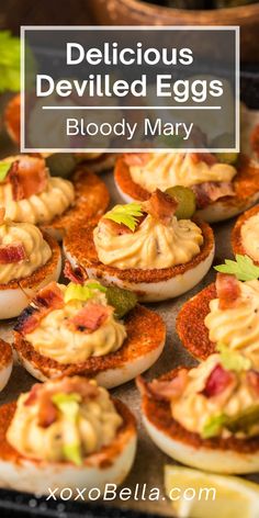 deviled eggs are topped with bacon and cheese