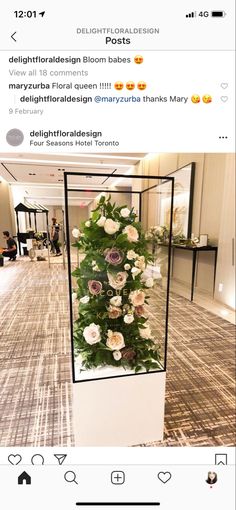 an image of flowers on display in the lobby