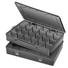 an open plastic box with compartments on the inside