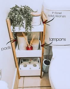 a bathroom with toilet paper, plants and other items labeled in the bottom half of it