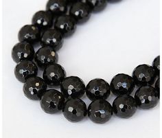 the beads are black and shiny