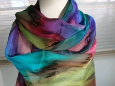 "This gorgeous multi-colored streaked scarf is hand painted and is 100% silk.  Hand hemmed as well. Lovely mixture of many colors dripping into each other to create a lovely picture for you to wear with your favorite outfit.  Imagine this with a Winter White outfit!!  I challenge you to find an outfit it won't look great with!! This scarf is 11\" x 58\"-60\" (27.940 cm x 147.32cm-152.40 cm) or 17\" x 72\" (43.180 cm x 182.88 cm) and should be dry cleaned or hand washed in cold water. Low iron st Winter White Outfit, Painted Rainbow, Wearing Color, Hand Dyed Silk, Hand Painted Silk, How To Wear Scarves, Scarf Gift, Silk Dyeing, Blue Lagoon