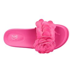 These slides feature a unique appeal with eye-catching flower appliqué that adds a touch of charm to your look. Not only are they visually striking, but they are also designed with comfort in mind, making them perfect for walking. The soft, cushioned sole ensures all-day wearability, while the floral details offer a playful and stylish twist. Whether you're heading to the beach or a casual outing, these slides blend fashion and function effortlessly. Spring Pink Eva Sandals, Pink Eva Sandals For Spring, Chic Pink Flip Flops For Summer, Trendy Spring Slide Flip Flops, Trendy Flower-shaped Sandals For Summer, Chic Pink Slides For Summer, Chic Pink Flat Slides, Trendy Eva Slides For Spring, Spring Eva Slides