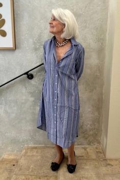 Description Like our breezy Boyfriend Dress? If you’d like a slightly longer, over-the-knee version, too, the Olivia Shirtdress is for you. Fitted through the shoulders and chest, this dress tapers gradually to the hem creating a loose fit through its waist and hips. Details Indigo with white shadow stripes 100% lightweight cotton fabric 3 ¼-inch-wide two-button cuffs Classic point collar Oversized chest pocket Side pockets built into each side seam Chest pocket Engraved mother-of-pearl buttons Shirttail-style hem Do's and Don'ts Made with a 100% cotton fabric, we suggest you machine-wash your Olivia Shirtdress in cool water using the gentle cycle. Shake out any wrinkles and hang to dry, or tumble dry low, removing promptly. Iron on cotton setting, if desired. Alternatively, you can profes Boyfriend Dress, Dressing Over 50, White Shadow, Clothes Spring, Mother Of Pearl Buttons, Pearl Buttons, Indigo Blue, Over The Knee, Striped Dress