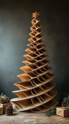 a cardboard christmas tree made out of brown paper