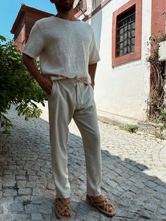 Boho Man Pants, Cotton Trousers, Oxford Casual outfit,Beach Man Natural 0utfit,Men's Wedding outfit,Hippie Outfit, Man Linen Pants,  Materials:50% Cotton, 50% Linen The model's height is 180 cm. She wore size M.  S, M, L,XL sizes. Cotton linen trousers for men who want to have a cool and comfortable style in the summer season are designed to be comfortable and stylish in daily life, in the office or at special celebrations, weddings or the beach. You can ask any question about the product, we ar Outfits For The Beach Men, Men’s Hippy Clothes, Grey Linen Pants Outfit Men, Man Boho Style, Men’s Linen Pants Style, Aesthetic Beach Outfits Men, Men’s Clothing Beach, Mens Linen Trousers, Men’s Beach Outfits