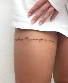 a woman's thigh with the words happily happens for a reason written on it