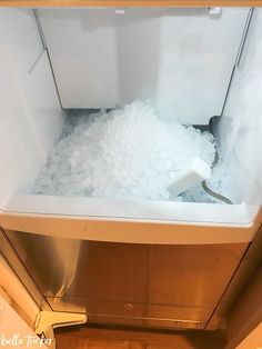 an ice bucket filled with lots of ice