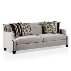 a gray couch with pillows on it