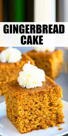 a slice of gingerbread cake on a white plate with whipped cream in the middle