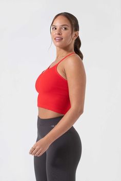 T4785 Raise the barre in the Strappy Tank. The curvilinear design and slender racerback offer a functional support while the soft fabric made from recycled yarns creates a light compression that feels barely there. Crafted and sewn in LA. OOTD: Headed to the studio? Pair the Strappy Tank with the One By One Legging for a fit that’s perfect for Pilates, Yoga, or Barre. Seamless High Stretch Tank Top For Training, High Stretch Seamless Tank Top For Training, Seamless Sports Bra With Medium Support And Tank Straps, Stretch Sleeveless Sports Bra In Recycled Polyester, Compressive Seamless Tank Top For Sports, Compressive Seamless Sports Bra With Tank Straps, Fitted Seamless Tank Top For Sportswear, Seamless Fitted Racerback Activewear, Fitted Seamless Tank Top For Yoga