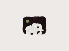 an elephant is in the middle of a black and white square with green dots on it