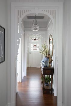 the hallway is clean and ready for us to use as an entrance way in this home