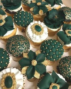 cupcakes decorated with green and gold decorations