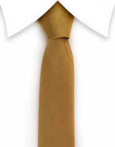 A skinny, gold, satin necktie that will add that golden touch to your wedding attire or special event wardrobe. Elegant Adjustable Solid Ties, Classic Gold Tie For Formal Occasions, Elegant Gold Tie For Black-tie Events, Classic Gold Suit And Tie Accessories For Black Tie, Elegant Gold Ties For Business, Classic Fitted Gold Ties, Classic Gold Tie And Suit Accessories, Elegant Gold Suit And Tie Accessories For Black-tie Events, Classic Gold Suit And Tie Accessories For Formal Events