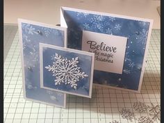 two cards that have snowflakes on them