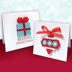 two greeting cards decorated with red, white and blue beads