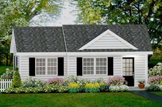 a small white house with black shutters and flowers