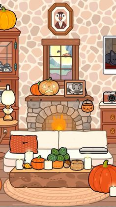 the living room is decorated for halloween with pumpkins on the table and other decorations