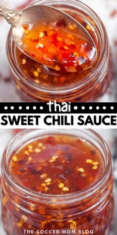 two jars filled with sweet chili sauce on top of a table