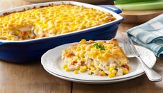 a casserole dish with chicken and corn