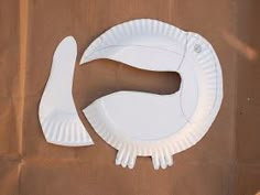 a paper plate shaped like a fish